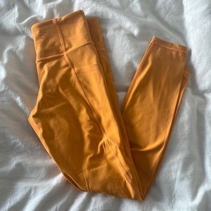 Athleta Sunrise Salutation Stash Pocket Tights